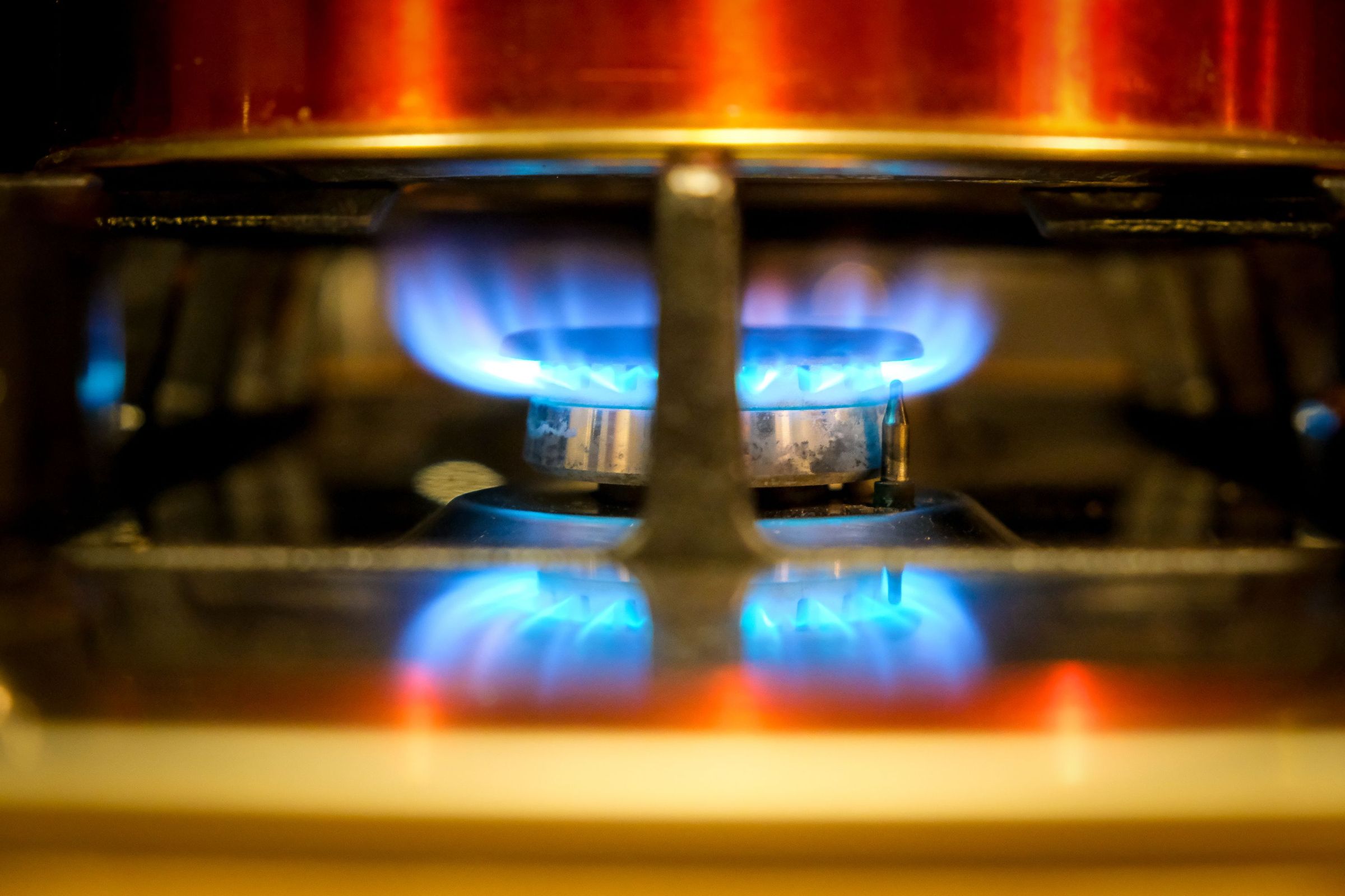 Blue gas flame under a burner